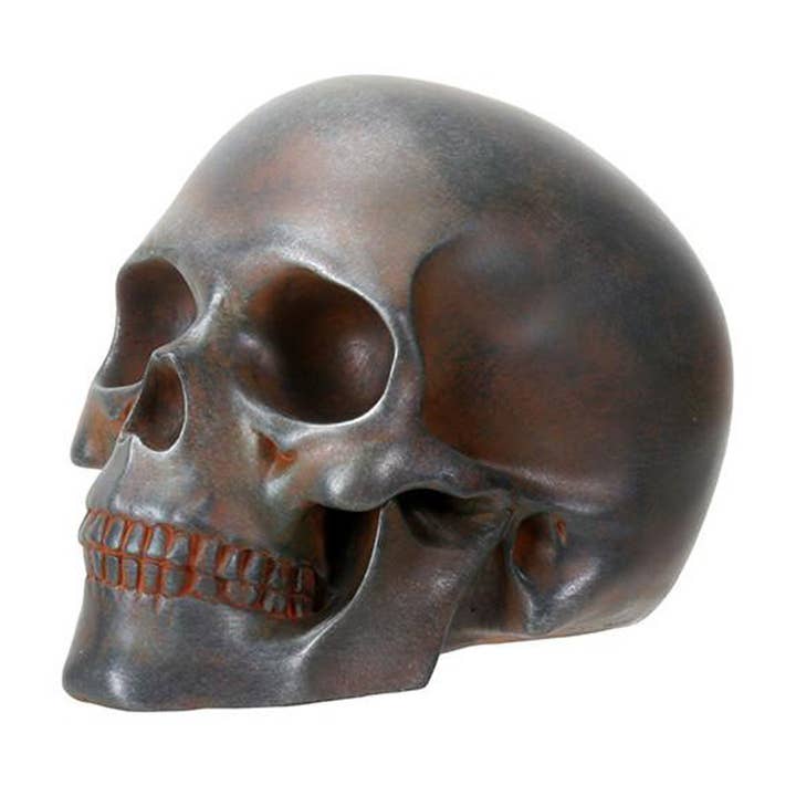 RUSTED SKULL STATUE